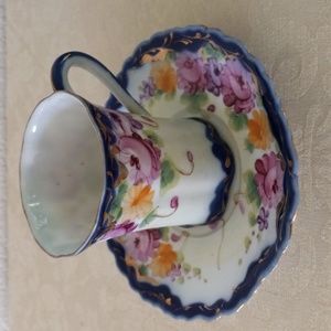 VINTAGE  Colbalt blue with floral trim tea cup & saucer.  Antique  porcelain.